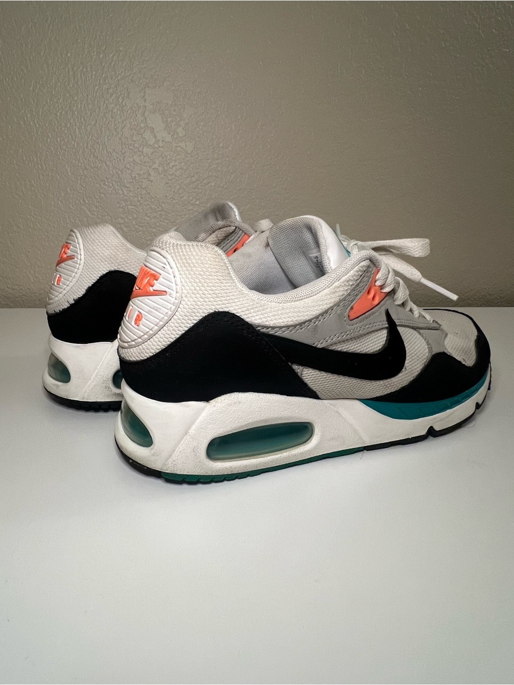 Nike women’s White Black Teal & Coral Accent Sneakers